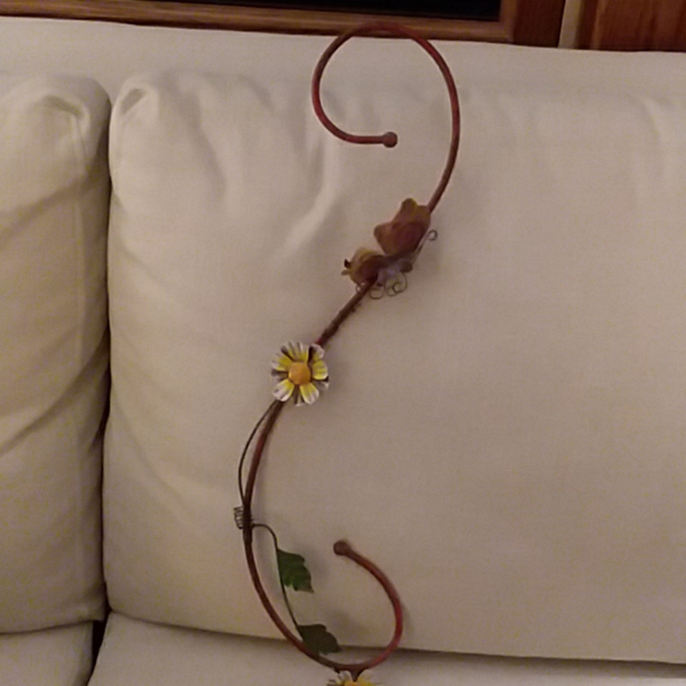 Metal plant holder.
